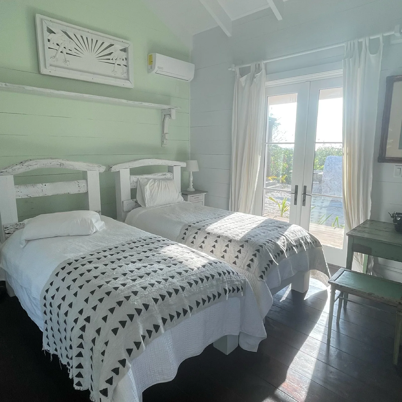 Coastal bedroom interior with striped headboard