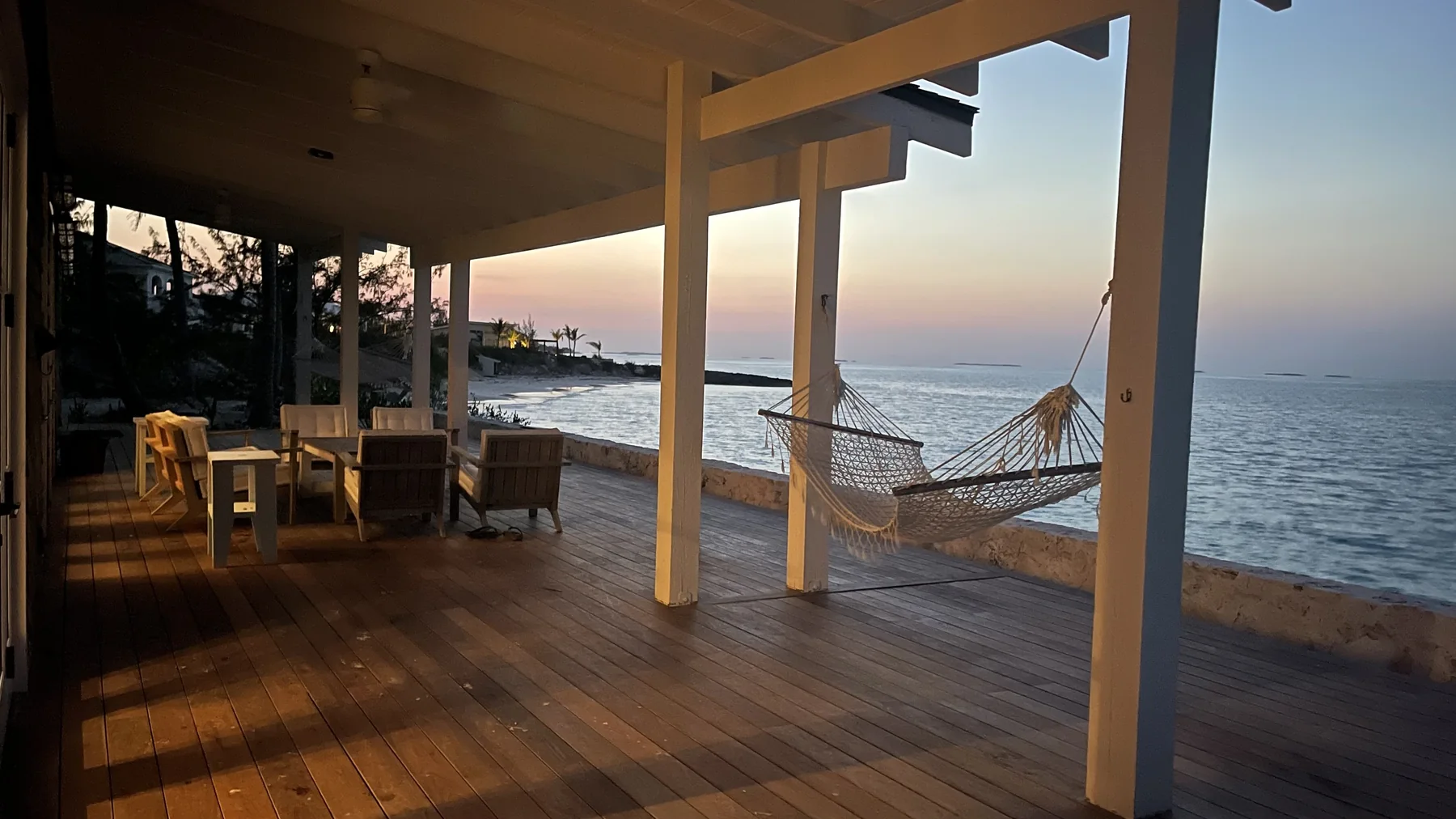 Hammock and deck overlooking the Gulf at golden hour
